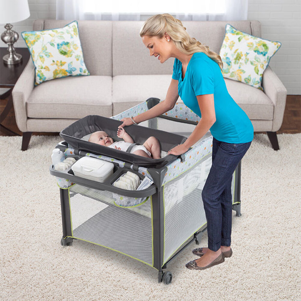 travel cot with changing table